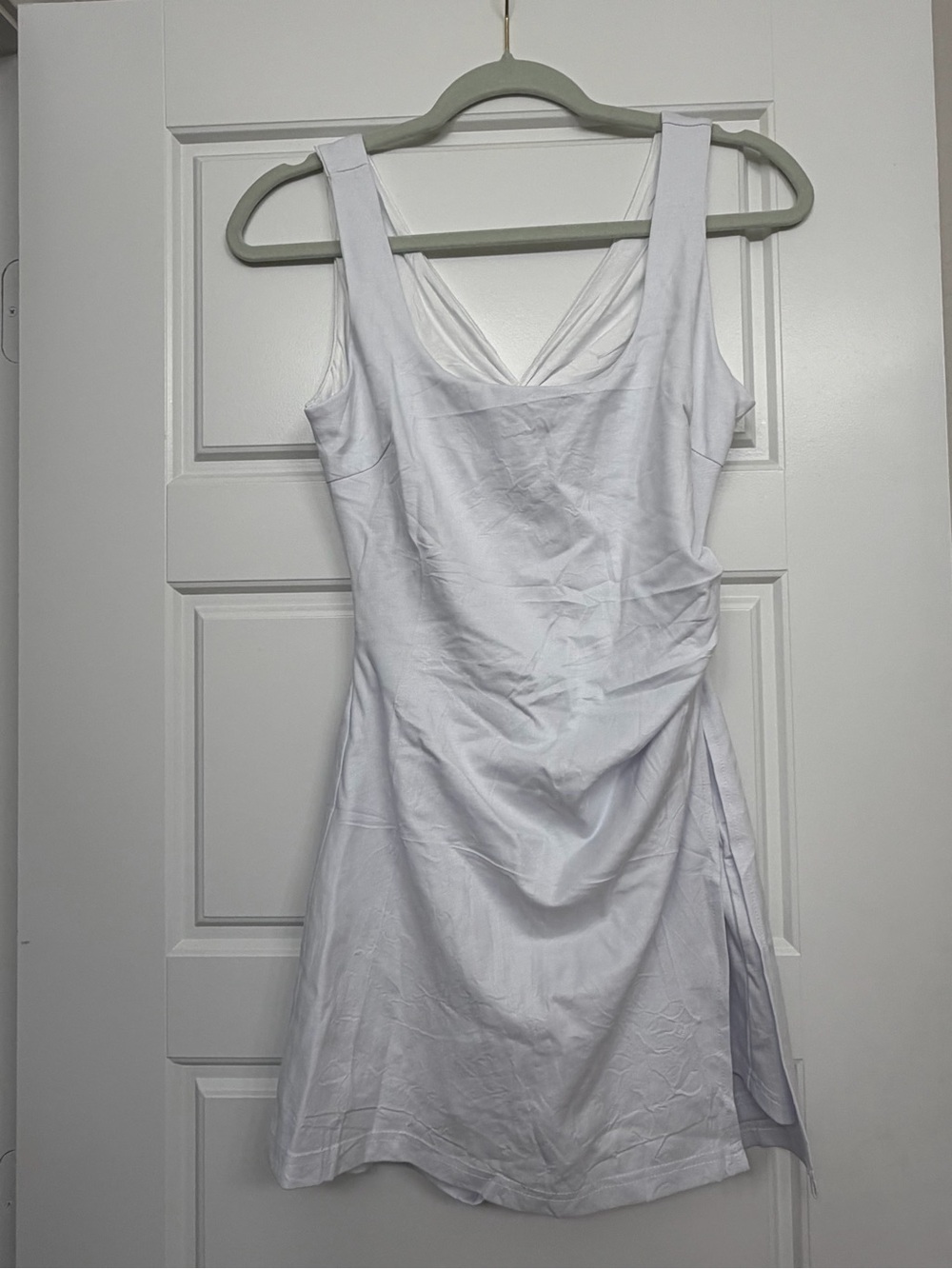 Sleeveless White Twist-Back Mini Dress with Back Cutout and Slit